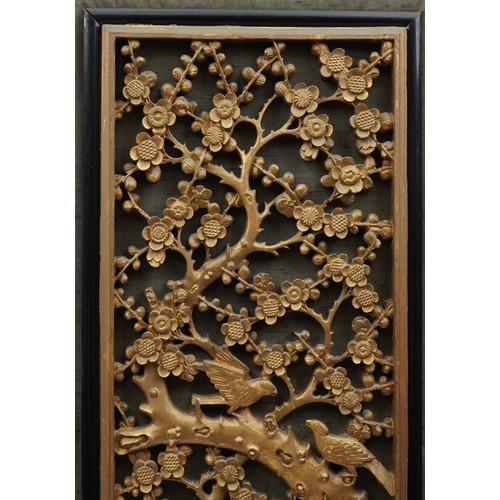 267 - Large Chinese carved gilt wood panel depicting birds amongst trees, framed, 101cm x 36cm excluding t... 