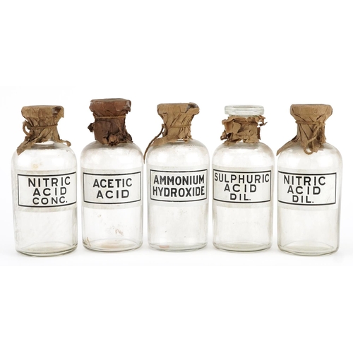 176 - Five vintage glass apothecary jars with labels including Ammonium Hydroxide, Nitric Acid Dil and Ace... 