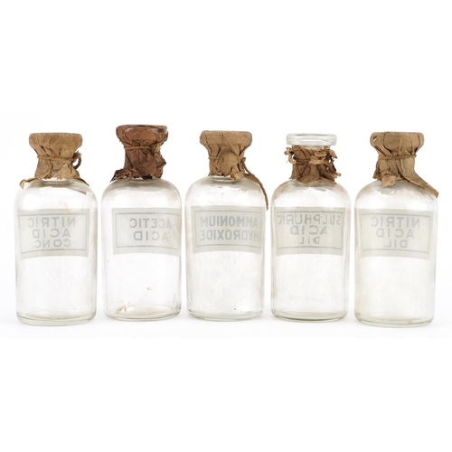 176 - Five vintage glass apothecary jars with labels including Ammonium Hydroxide, Nitric Acid Dil and Ace... 