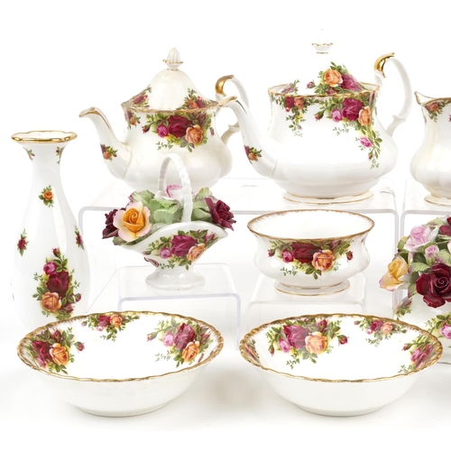 659 - Royal Albert Old Country Roses china including teapot, vases and flower studies, the largest 22cm in... 