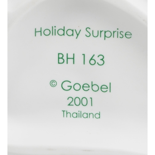 657 - Eleven Goebel Hummel hand painted figures including Holiday Surprise and Making Spirits Bright, the ... 