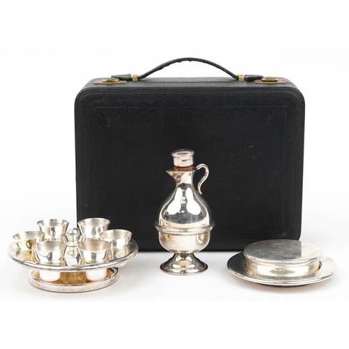 479 - Late 19th/early 20th century silver plated holy communion set housed in a velvet and silk lined fitt... 