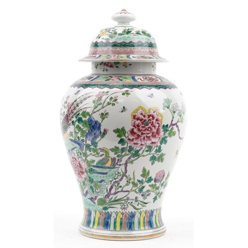 492 - Large Chinese porcelain baluster vase and cover hand painted in the famille rose palette with butter... 