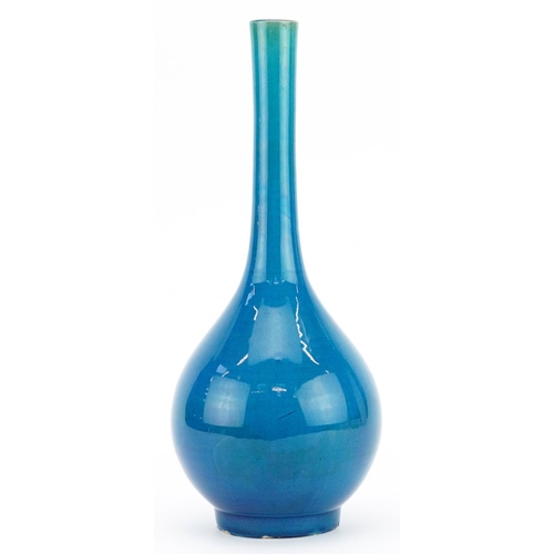 331 - Chinese porcelain long neck bottle vase having a blue glaze, 31cm high