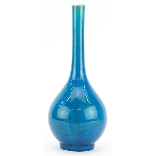 331 - Chinese porcelain long neck bottle vase having a blue glaze, 31cm high