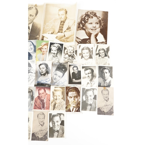 780 - Film star autographs and facsimile signatures on photographs and cards including Bing Crosby, Peter ... 