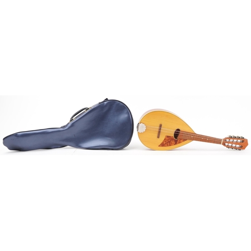 612 - Cremona, vintage mandolin with case, 63cm in length