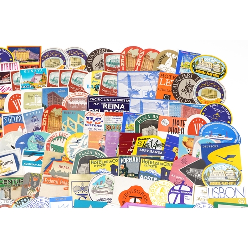846 - Large collection of aviation interest luggage tags and stickers, approximately one hundred and fifty