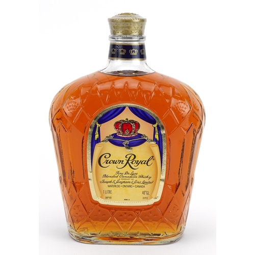 664 - One litre bottle of Crown Royal Canadian whisky with cloth pouch and box