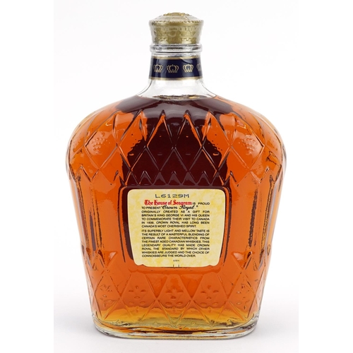 664 - One litre bottle of Crown Royal Canadian whisky with cloth pouch and box