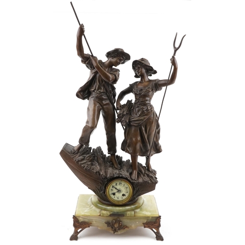 38 - After Ernest Rancoulet, large patinated spelter figural clock in the form of two farmers entitled So... 