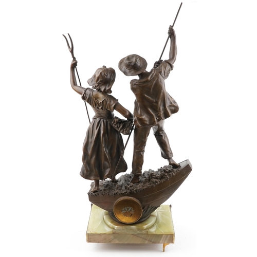 38 - After Ernest Rancoulet, large patinated spelter figural clock in the form of two farmers entitled So... 