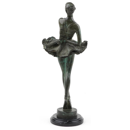 391 - After Edgar Degas, large verdigris patinated bronze ballerina raised on a circular marbleised base, ... 