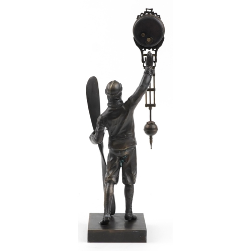 504 - Patinated bronze military interest mystery clock in the form of a pilot, 37cm high