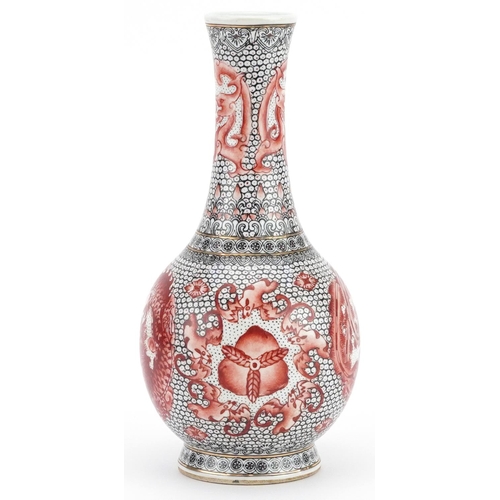 452 - Chinese porcelain vase hand painted in iron red with roundels of a phoenix and dragons, six figure c... 