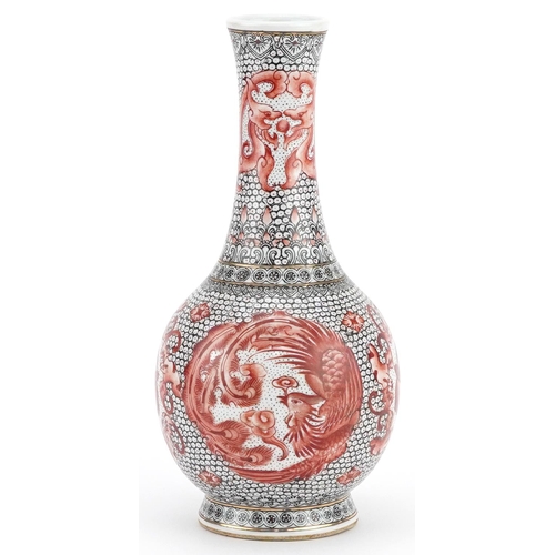 452 - Chinese porcelain vase hand painted in iron red with roundels of a phoenix and dragons, six figure c... 