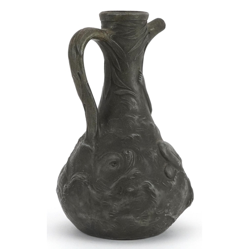 403 - Jean Garnier, French Art Nouveau pewter jug decorated in relief with a nude female and two mythical ... 