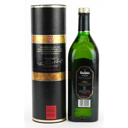 466 - One litre bottle of Glenfiddich Pure Malt Scotch whisky with box, first distilled on Christmas day 1... 