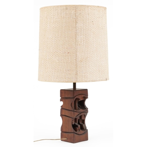 393 - 1970s carved teak table lamp with shade, overall 63cm high