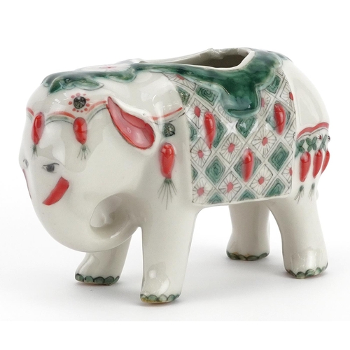 495 - Chinese porcelain spill vase in the form of an elephant, 15cm in length