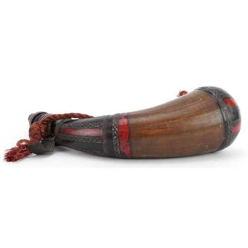 224 - Middle Eastern lacquer and horn powder flask with metal inlay, 29cm in length