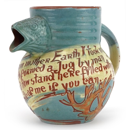 102 - C H Brannam, Arts & Crafts jug with fish spout and incised motto, 14.5cm high