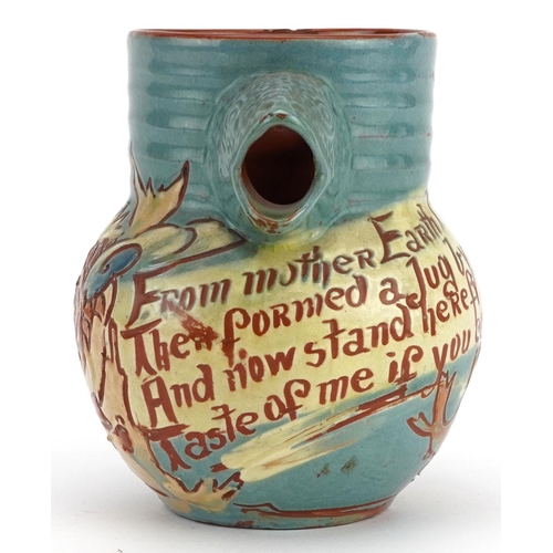 102 - C H Brannam, Arts & Crafts jug with fish spout and incised motto, 14.5cm high