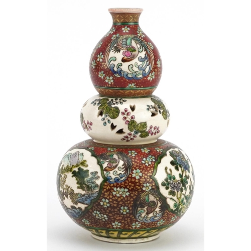 330 - Japanese triple gourd vase with reticulated section hand painted with flowers, four figure character... 