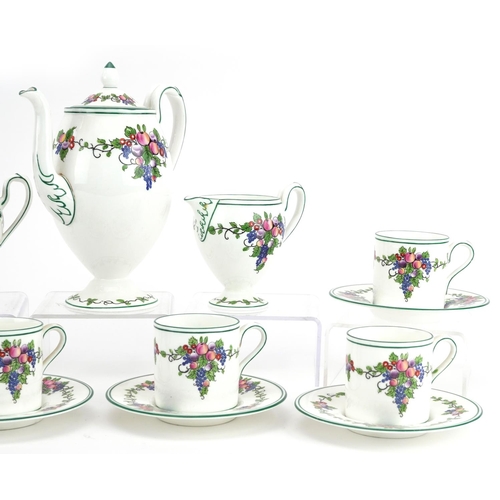 651 - Wedgwood six place coffee service decorated with fruit comprising coffee pot, six coffee cans with s... 