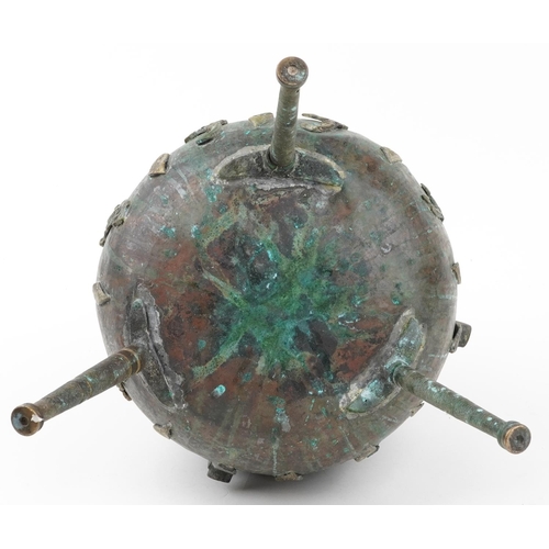 437 - Large Middle Eastern patinated bronze three footed handled vessel, 64cm high