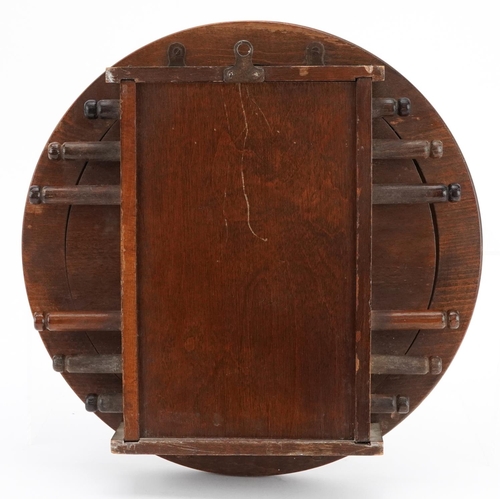 340 - Edwardian circular oak wall perpetual roller calendar, 30cm in diameter