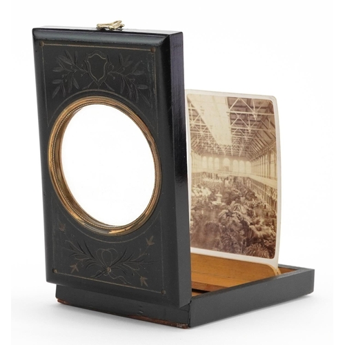 808 - Philadelphia International Exhibition bronze medallion and an ebonised card viewer with five photogr... 