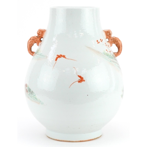 319 - Chinese porcelain Hu arrow vase with twin handles hand painted in the famille rose palette with an e... 