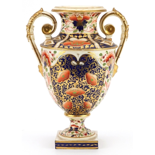 165 - Davenport, early 19th century twin handled vase hand painted in the Imari palette, 29cm high