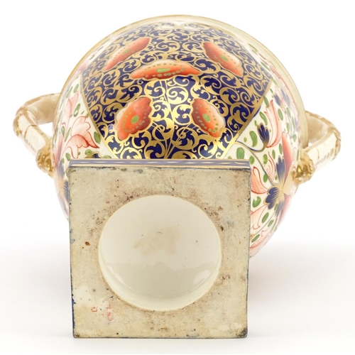 165 - Davenport, early 19th century twin handled vase hand painted in the Imari palette, 29cm high