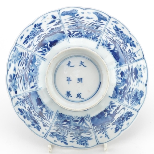 25 - Chinese blue and white porcelain bowl hand painted with panels of flowers, six figure character mark... 