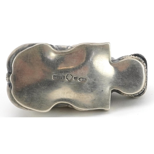 476 - Silver recumbent hippopotamus with ruby eyes, impressed Russian marks to the base, 7.5cm in length, ... 