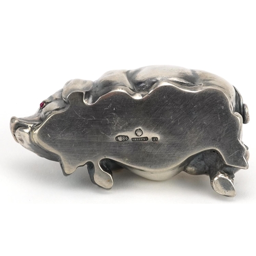 289 - Silver recumbent pig with ruby eyes, impressed Russian marks to the base, 7cm in length, 44.0g