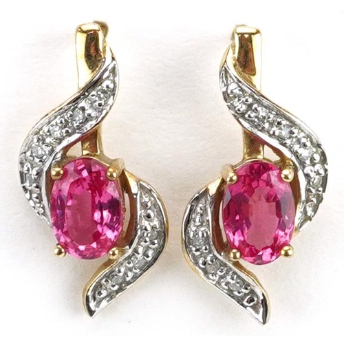 3212 - Pair of 9ct gold ruby and diamond stud earrings, 1.7cm high, 2.0g