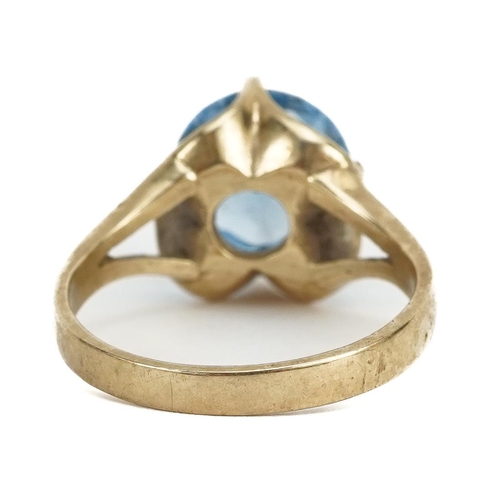 3223 - 9ct gold blue stone solitaire ring, the blue stone approximately 10.0mm in diameter, size O, 4.0g