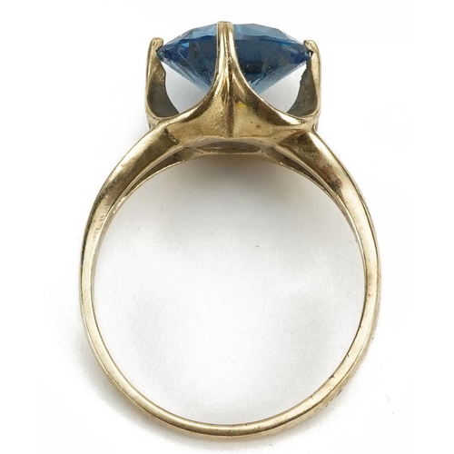 3223 - 9ct gold blue stone solitaire ring, the blue stone approximately 10.0mm in diameter, size O, 4.0g