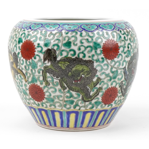 213 - Chinese porcelain jardiniere hand painted in the famille rose palette with mythical animals amongst ... 