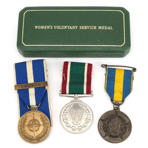 1223 - Three military interest medals including a Women's Voluntary Service medal with box