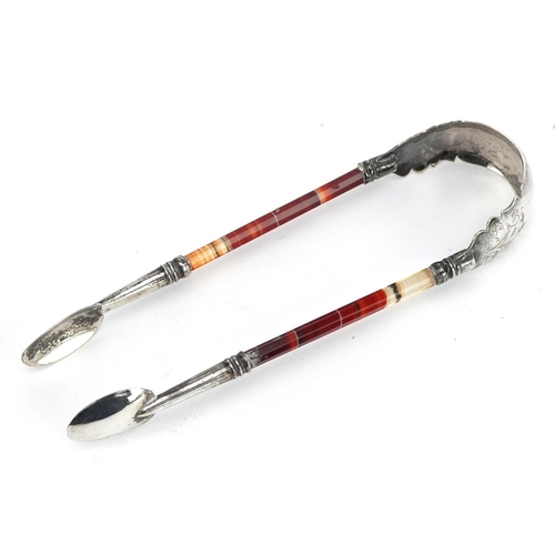 94 - Pair of antique unmarked silver and agate sugar tongs, 12cm in length, 13.0g