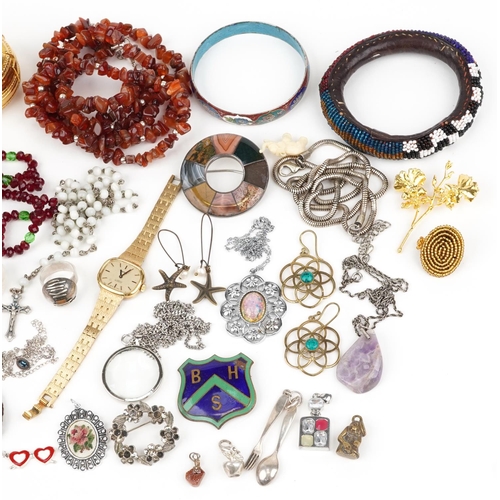 3806 - Vintage and later jewellery, some silver, including a silver Scottish hardstone brooch, large amber ... 