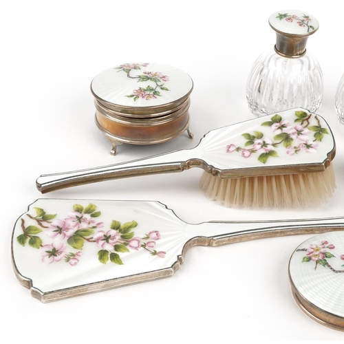 189 - Seven silver and guilloche enamel vanity items including hand mirror, clothes brush, jewel box and a... 