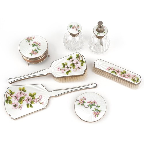 189 - Seven silver and guilloche enamel vanity items including hand mirror, clothes brush, jewel box and a... 