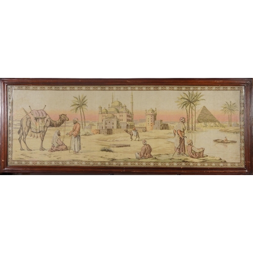 268 - Arabs in the desert before a mosque, 19th century style tapestry, framed and glazed, 140cm x 48cm ex... 