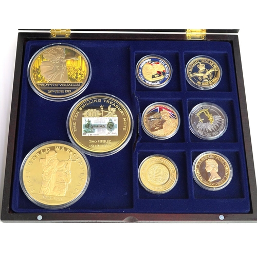 673 - Collection of predominantly gold plated commemorative coins including examples commemorating World W... 