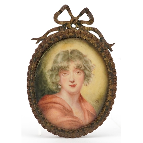 91 - 19th century oval hand painted portrait miniature of a young female housed in an ornate brass frame ... 